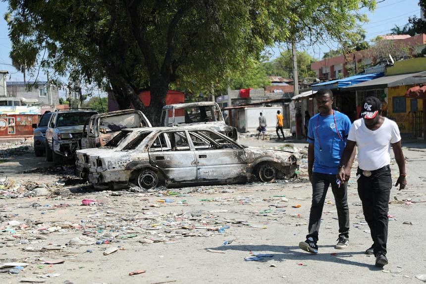 Haiti capital a 'city under siege' amid spasm of gang violence The