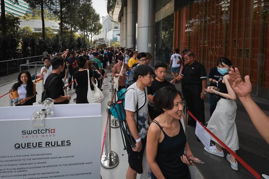 Snaking queue outside Ion Orchard on launch of Snoopy-themed MoonSwatch