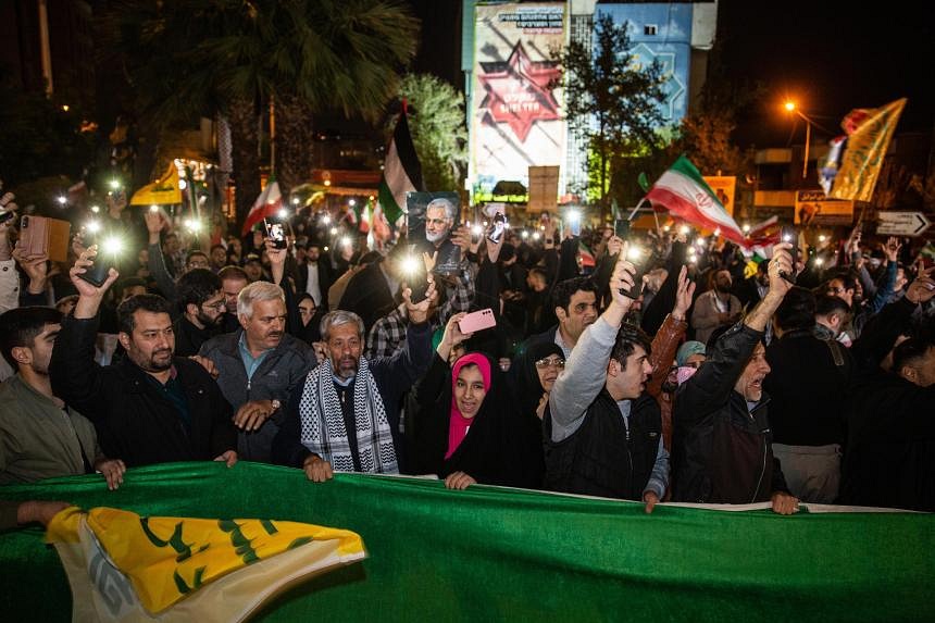 Thousands gather in Iran in show of support for attack on Israel | The ...