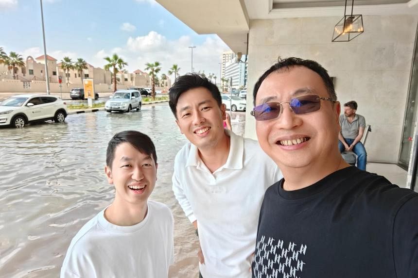 Singapore visitors in Dubai for crypto events face wash-out as floods hit
