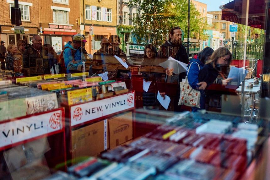 Vinyl enthusiasts spin into action on UK’s Record Store Day | The ...