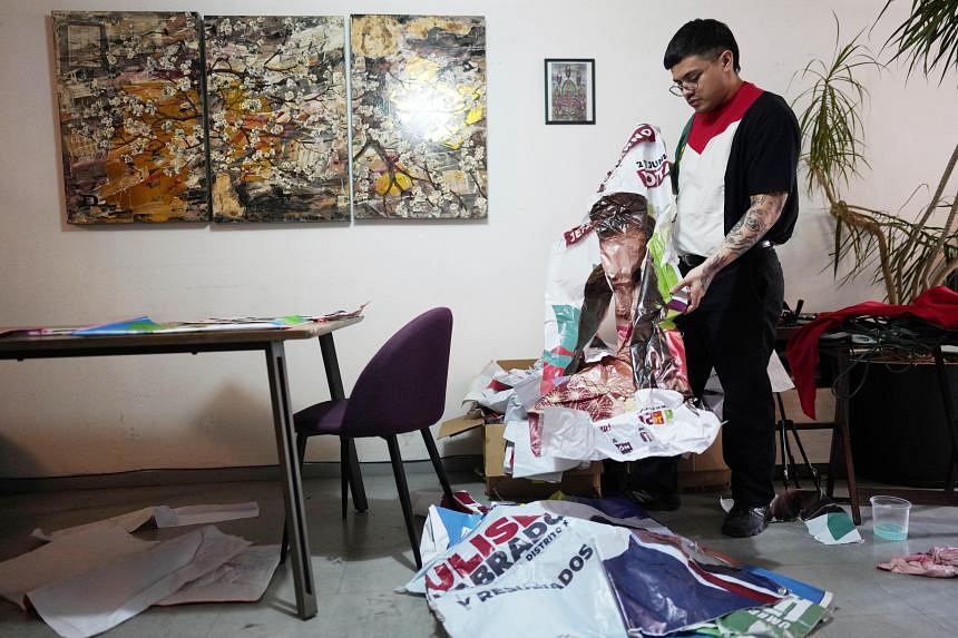 Mexican fashion designer recycles election ads into tote bags