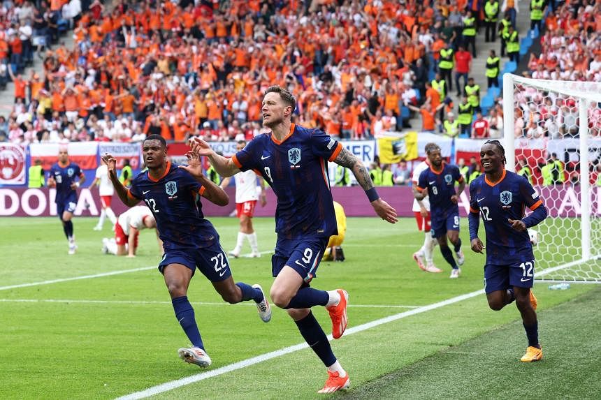 Late Wout Weghorst goal gives Dutch a 2-1 win over Poland in Euro 2024 opener