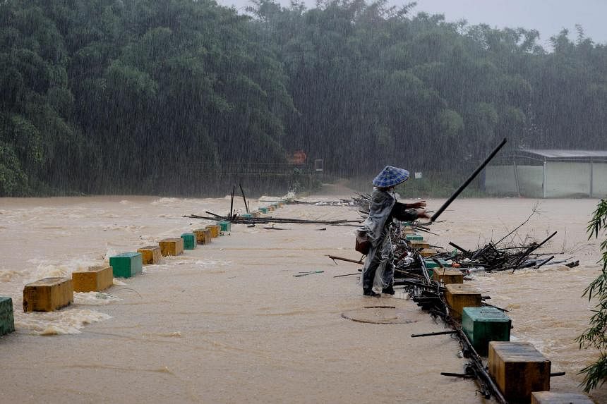 Flooding hits China’s south, temperatures sizzle elsewhere