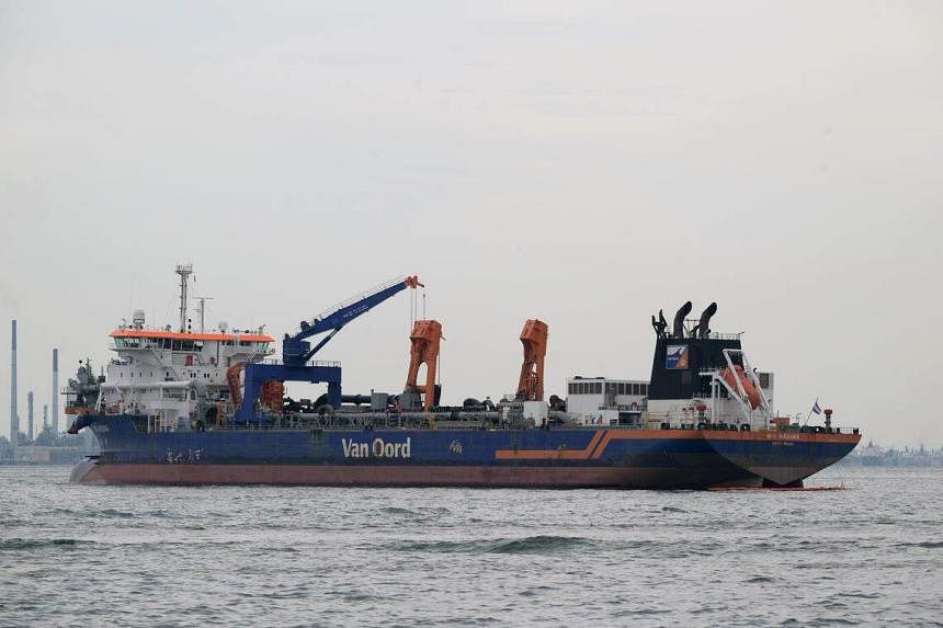 st explains: why stationary vessel will have to shoulder all claims for recent s’pore oil spill