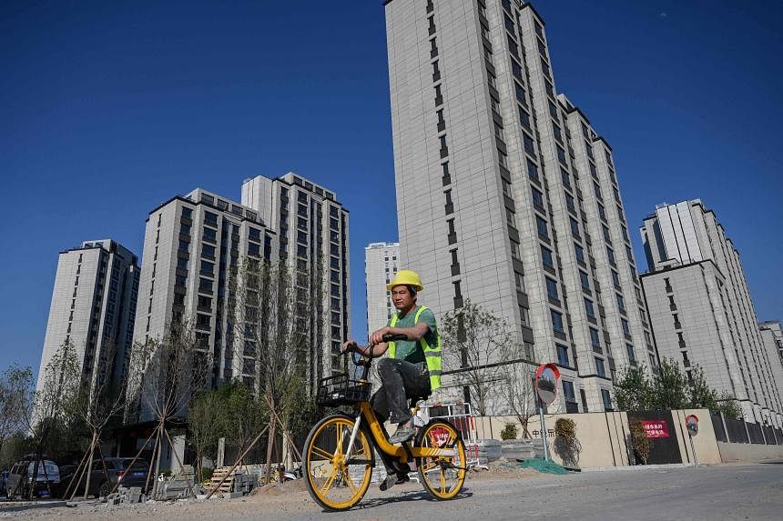 China’s slump in home sales slows after cities ease policy