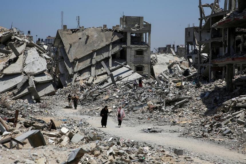 Bodies trapped in Gaza City under Israeli assault as mediators push for ...