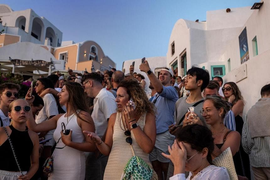 Greece's Santorini bursts with tourists as locals call for a cap