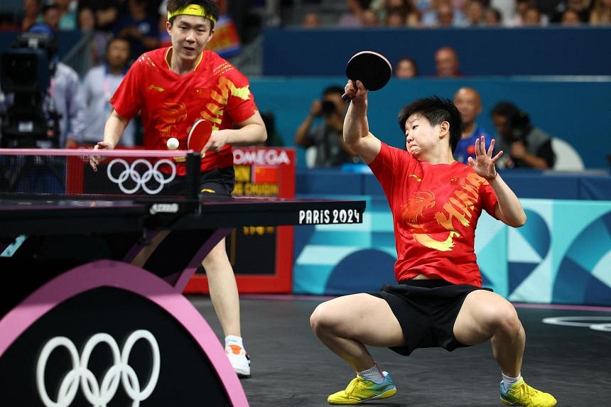 Wang Chuqin and Sun Yingsha win table tennis mixed doubles gold after ...