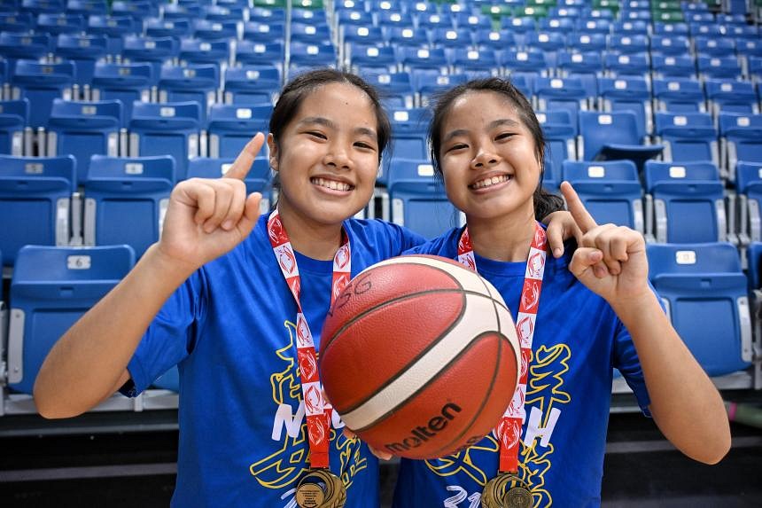 Double trouble: Nanyang Girls' High defends C Division basketball title; National JC claims 1st C Division boys title