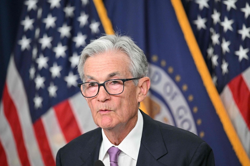 Fed cuts rates by half a percentage point, cites 'greater confidence' about inflation