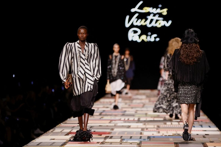 Louis Vuitton shows flouncy, layered looks at the Louvre for Paris Fashion Week