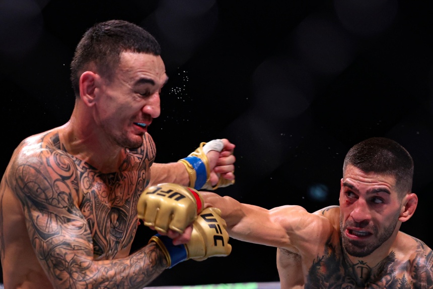 Ilia Topuria KOs Max Holloway to retain UFC featherweight mixed martial