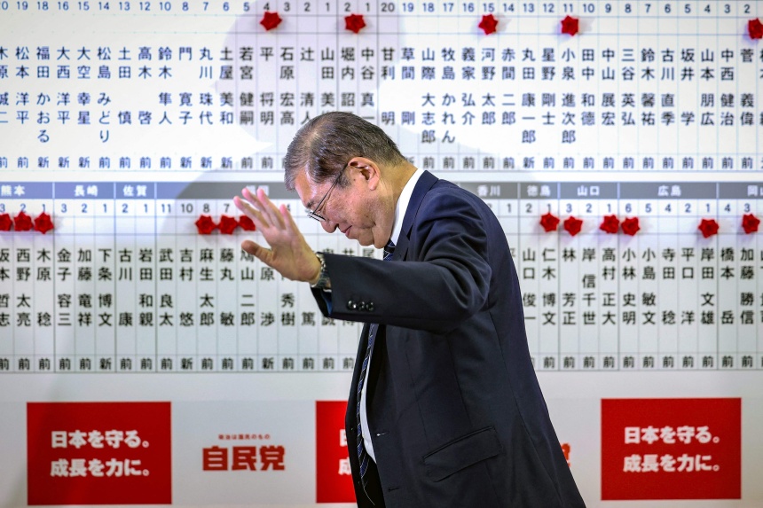 Japan ruling coalition projected to lose majority in election The