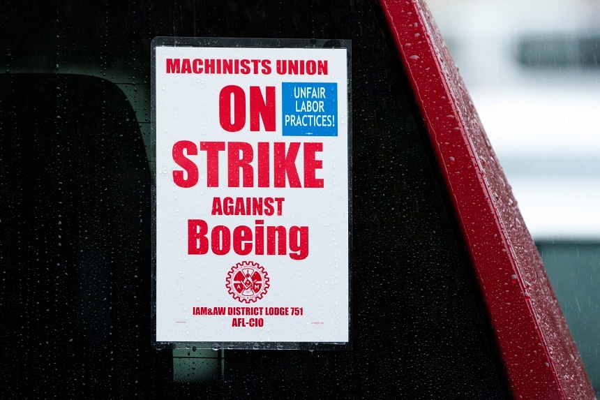 Striking workers weigh latest Boeing contract offer