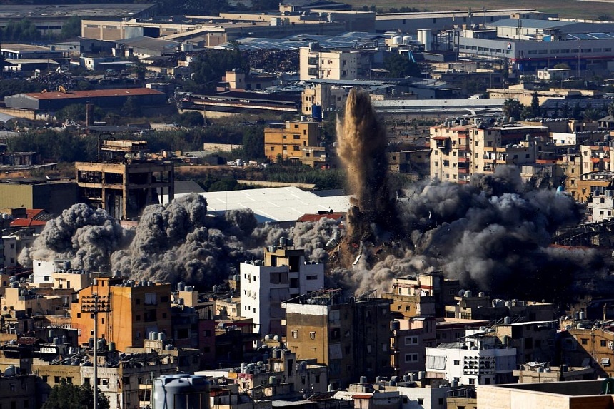 Israel strikes Hezbollah areas in Beirut, southern Lebanon for third day