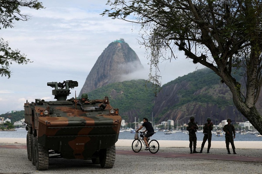 Troops, armored cars and patrol boats protect G20 summit