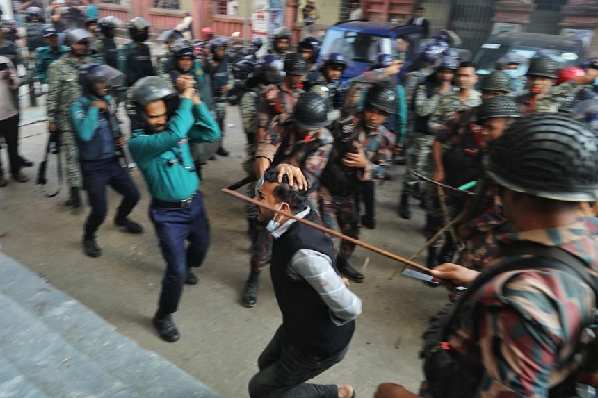 Bangladesh steps up security, arrests six for lawyer's killing amid protests