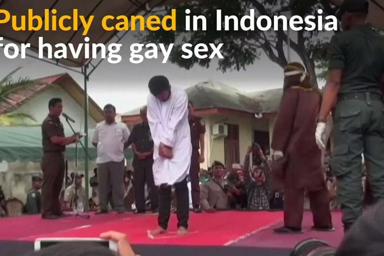 Gay Indonesians Caned In Front Of Jeering Crowd In Aceh For Having Sex The Straits Times