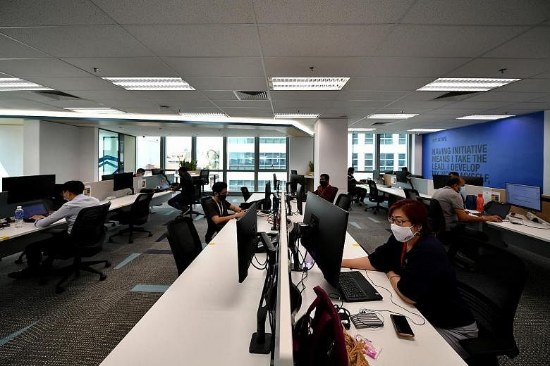 Up to 75% of staff can return to office from April 5; working from home no  longer default mode | The Straits Times