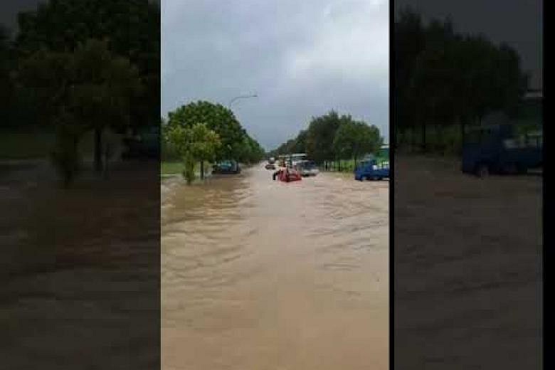 Flash floods in eastern Singapore, cars deep in muddy water in Pasir ...