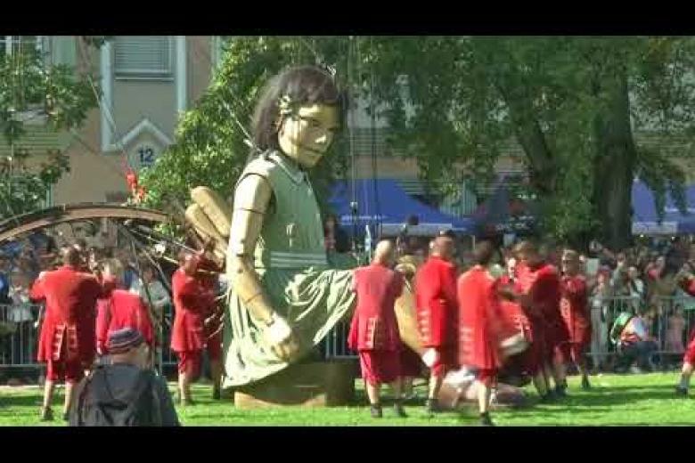Giant puppets walk on Geneva streets The Straits Times