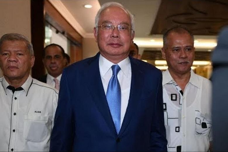 Former Malaysia Premier Najib Razak In Court For 1MDB Corruption Trial ...