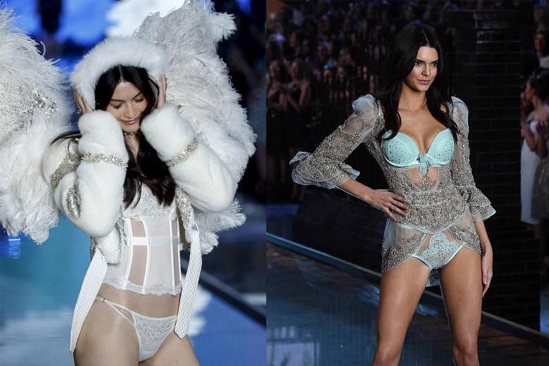 American model Martha Hunt (left) sports the blinged-out, bespoke Swarovski lingerie creation as one of the 10 new angels. China model Ming Xi (above left) is decked out for Christmas, while American model Kendall Jenner (above right) joins the angel