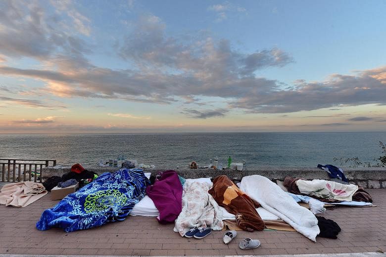 Migrants sleeping by the sea in Ventimiglia, on the Italian border with France, earlier this month. No European Union member ranks among the 10 major refugee-hosting countries, yet Europeans act as if they were on the verge of being "invaded".