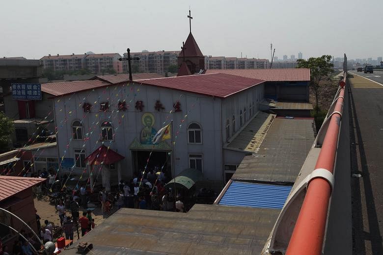 Worshippers entering the independent Zhongxin Bridge Catholic Church in Tianjin. Conditions for underground churches have worsened in recent years, compared with state-run churches.
