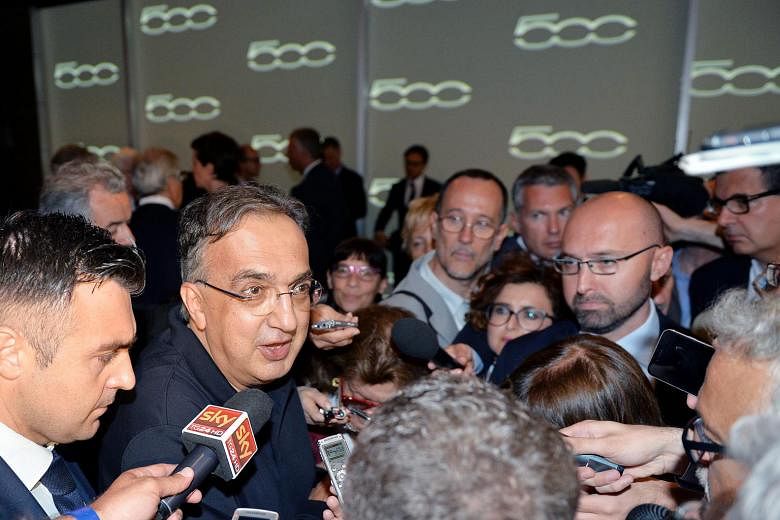 Fiat Chrysler CEO Sergio Marchionne (second from left) at the presentation of the Fiat 500. Referring to the IPO, he said "there is also the scarcity value as we are just selling a 10 per cent stake".