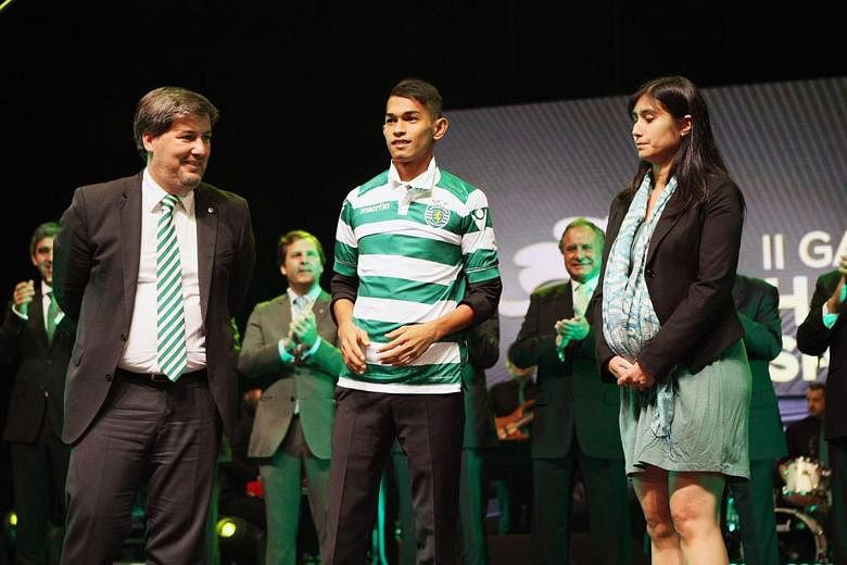 Martunis (centre) gets a chance to hone his skills at Sporting Lisbon, which was where Ronaldo started his career. Ronaldo, then with Manchester United, meeting seven-year-old Martunis, who spent 19 days after the tsunami all by himself.