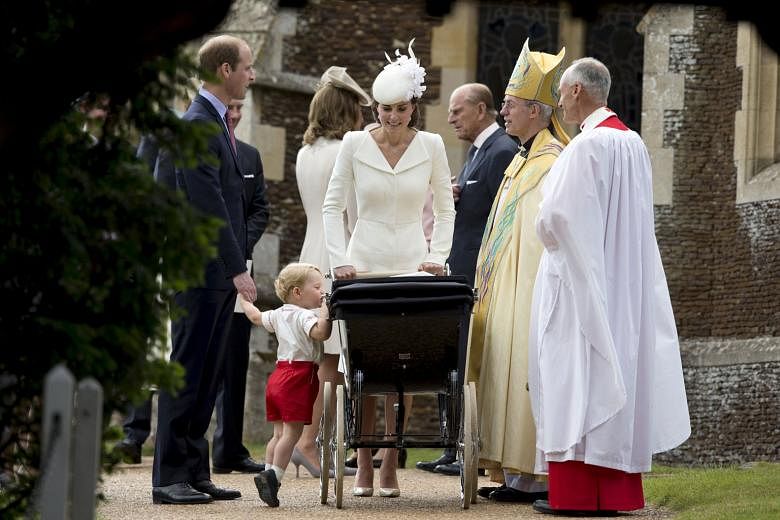 Princess Charlotte's full name is Charlotte Elizabeth Diana, in a nod to her great-grandmother, the queen, and her late grandmother. (Right) Prince William and his wife Kate, with the Archbishop of Canterbury Justin Welby and the queen's husband Prin