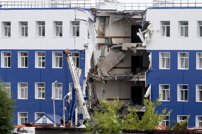 The section of the military barracks just outside the Siberian city of Omsk that collapsed on Sunday night. A probe into negligence, violation of safety rules and abuse of power will be carried out.