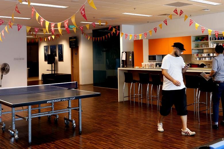 The central meeting point in the Ubisoft office is a large open pantry that comes with a game lounge and a ping-pong table.