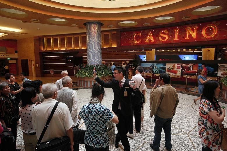 Genting Singapore, which owns Resorts World Sentosa (above), cited a downturn in the gaming industry in Asia as a factor in its results.