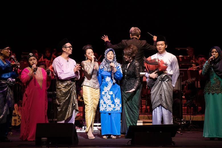 Performers such as Najip Ali (second from left) held a tribute concert, Si Cempaka Biru, for Malay music legend Nona Asiah.