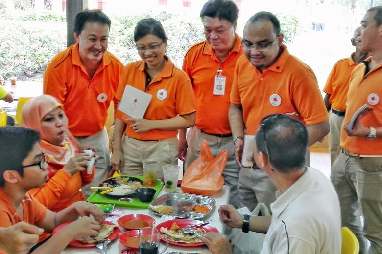 Ms Hazel Poa (standing, second from left), with (from left) NSP member Lim Tean, president Sebastian Teo and party member Mohamed Fazli Talip during a recent walkabout in Tampines East. Ms Poa is the third NSP secretary- general to resign this year. 