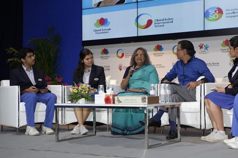 Peace activist Ela Gandhi (second from right), the granddaughter of Indian independence leader Mahatma Gandhi, giving a talk yesterday at the Global Indian International School (GIIS). Ms Gandhi, 75, spoke about her experience fighting apartheid alon