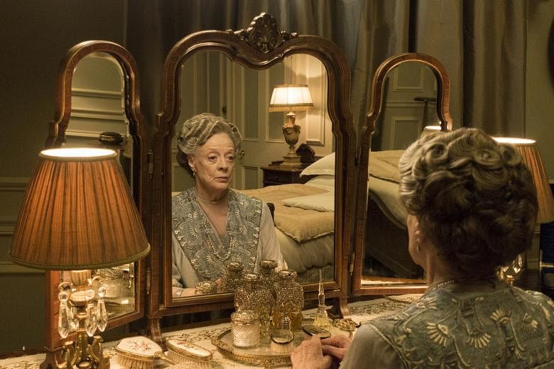Dame Maggie Smith in Downton Abbey (left). The trick of the series is for it to be very densely plotted so that there are lots of different stories going on, says creator Julian Fellowes.