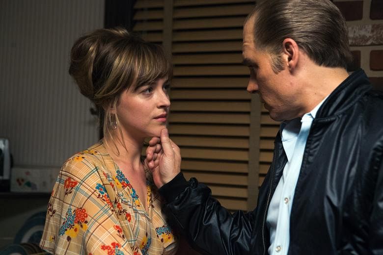 Dakota Johnson (left, with Johnny Depp as James "Whitey" Bulger in Black Mass) relishes the challenge of playing the wife of the Boston mobster in the film.