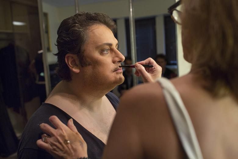 Latvian tenor Aleksandrs Antonenko being made up, but not darkened, for a production of Otello.