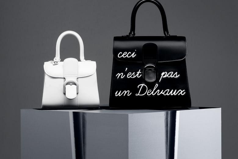 Delvaux artistic director Christina Zeller (above) says younger customers love the Ceci N'est Pas Un Delvaux (This is not a Delvaux, left) version of the Brilliant bag (far left), the brand's most classic bag.