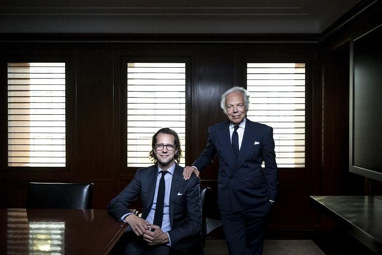 Ralph Lauren (far right) will hand over the reins of his company to Mr Stefan Larsson (right) next month.