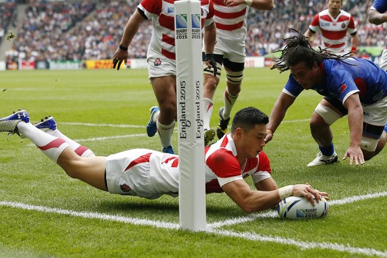 Akihito Yamada scoring the first try for Japan in their comfortable 26-5 Pool B win over Samoa on Saturday in Milton Keynes.