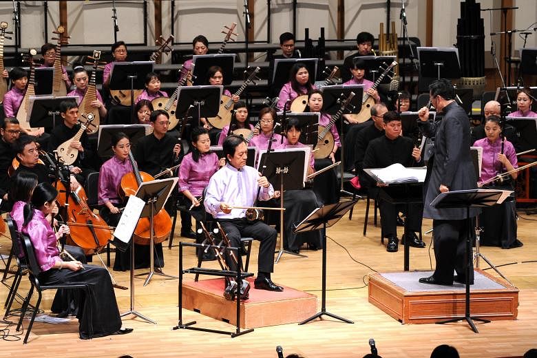 SCO concert master Li Baoshun playing the huqin at the Singapore Chinese Orchestra concert on Friday night. It was the first of two preview concerts being staged by SCO here. A preview of its Kuala Lumpur concert will be held at the Singapore Confere