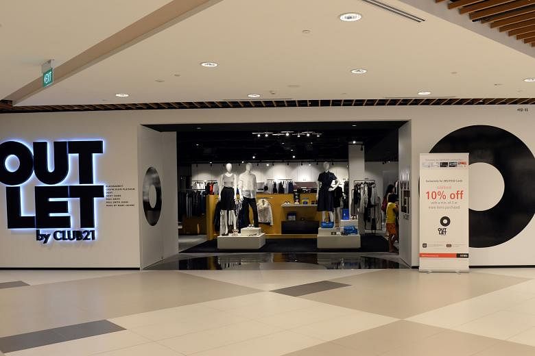 The 2,500 sq ft Outlet by Club 21 carries brands such as Blackbarrett, Calvin Klein, DKNY and Paul Smith, with products at up to 60 per cent off regular prices.