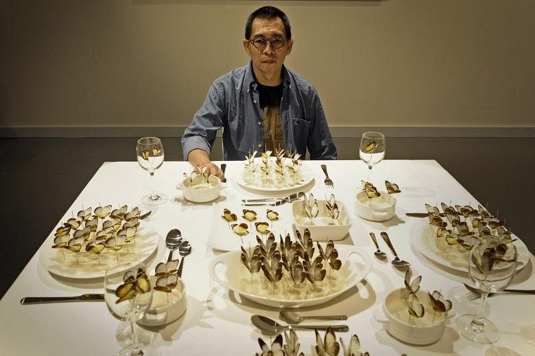 Artist FX Harsono with his 2008 installation, Bon Appetit. He won the inaugural Joseph Balestier Award this year.