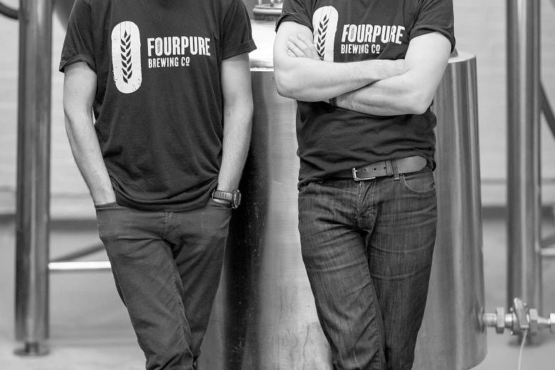 Thomas (far left) and Daniel Lowe (left) are brothers and co-founders of Fourpure Brewing Company, whose range of canned craft beers (below) is featured at the Singapore Craft Beer Week.