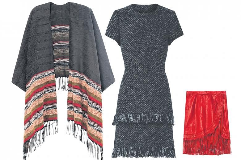 From far left: Maje's oversized Eagle poncho, Rabata dress and fringed Jawa leather skirt from its current collection.